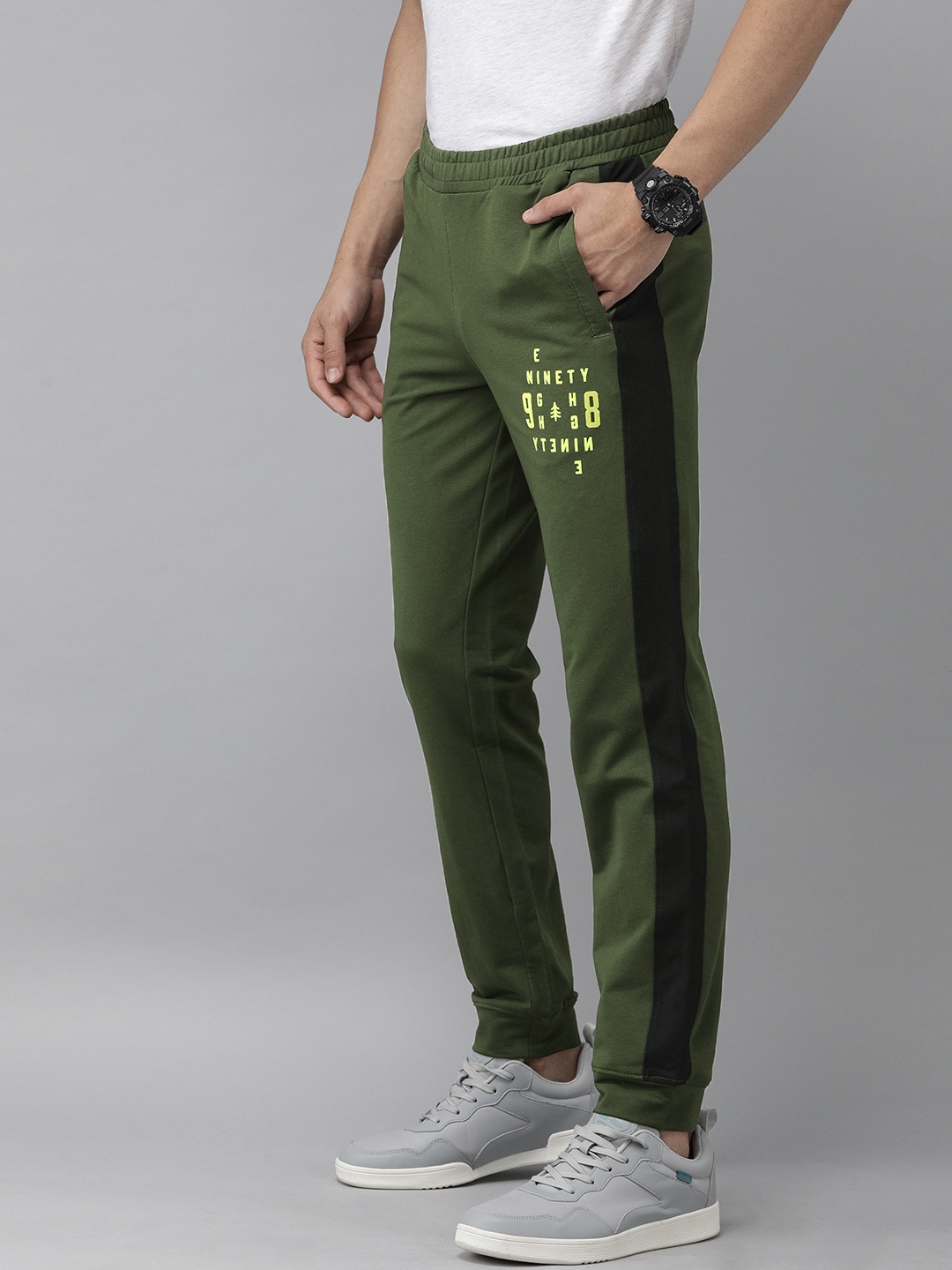 

Wildcraft Men Olive Green Striped with Print Off Active Track 9 Straight Fit Joggers