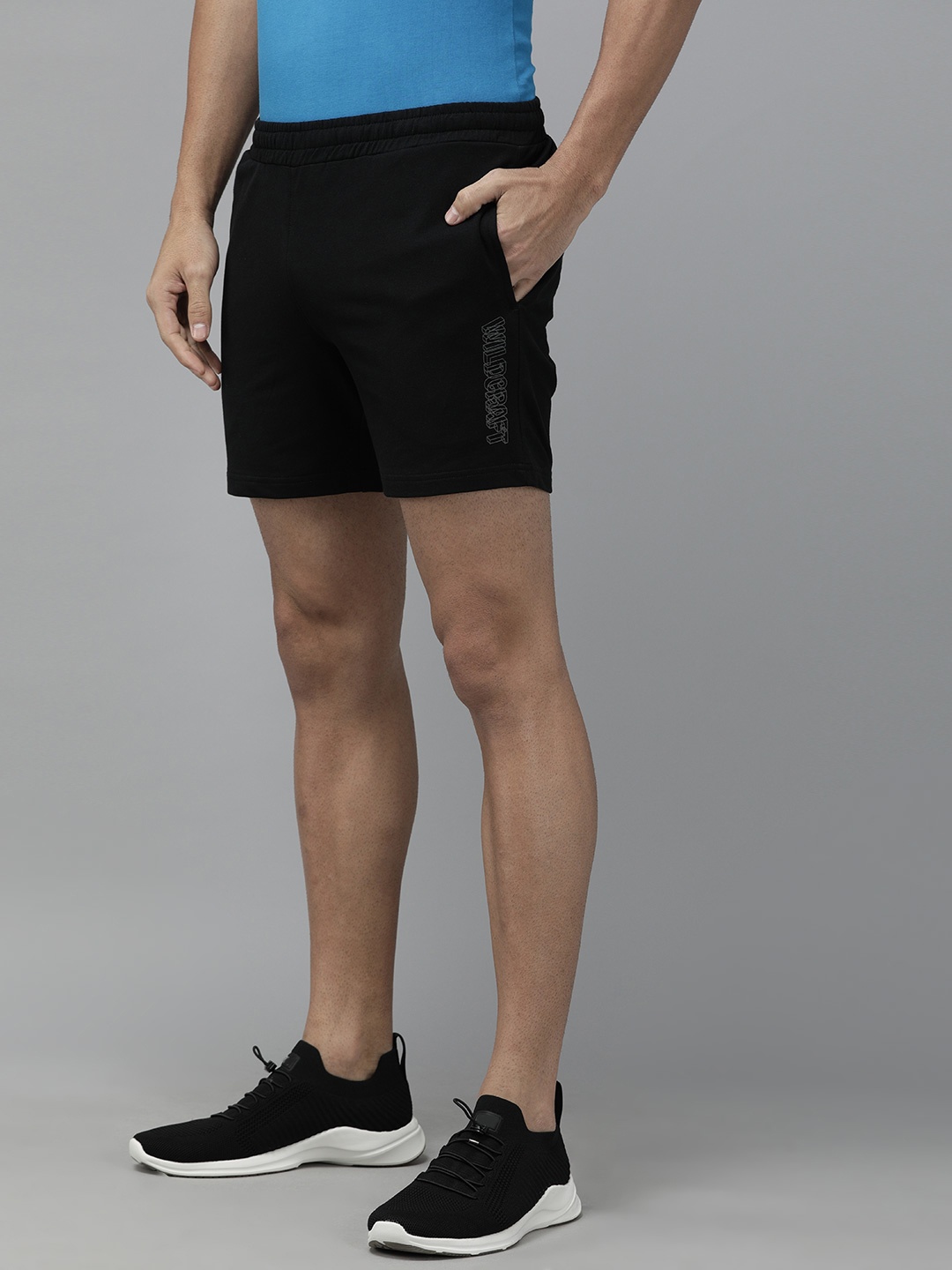

Wildcraft Men Black Solid Regular Fit Sports Shorts
