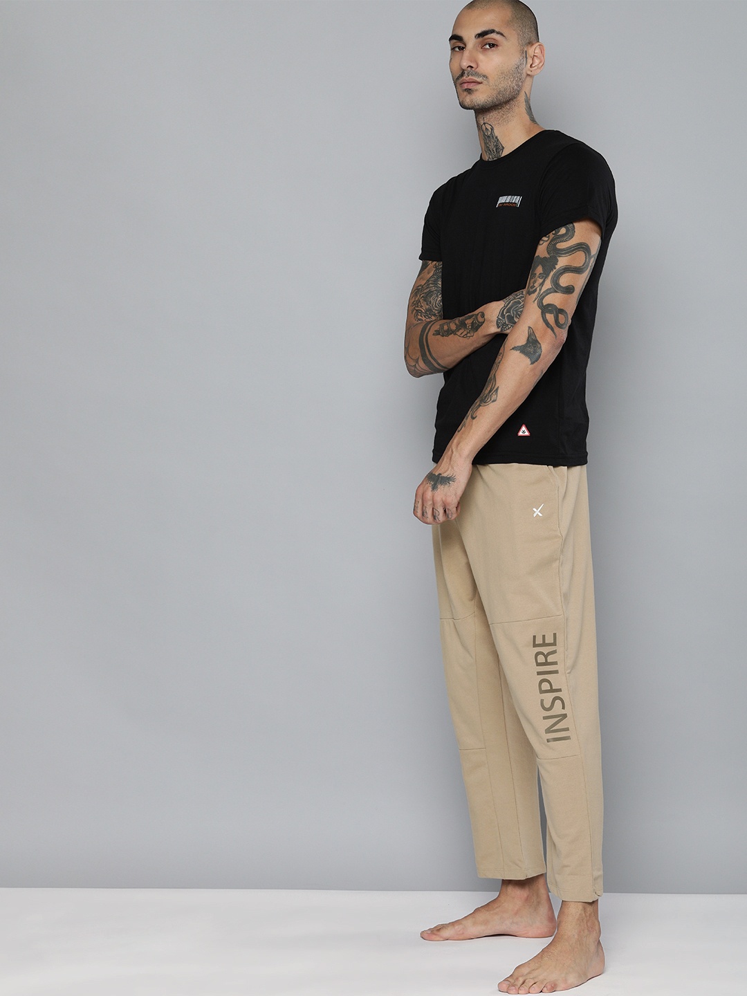 

HRX By Hrithik Roshan Men Myrobolan Typographic Organic Cotton Yoga Sustainable Track Pants, Beige