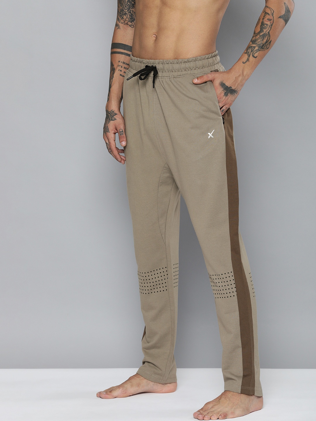 

HRX by Hrithik Roshan Men Beige & Brown Printed Yoga Sustainable Track Pants
