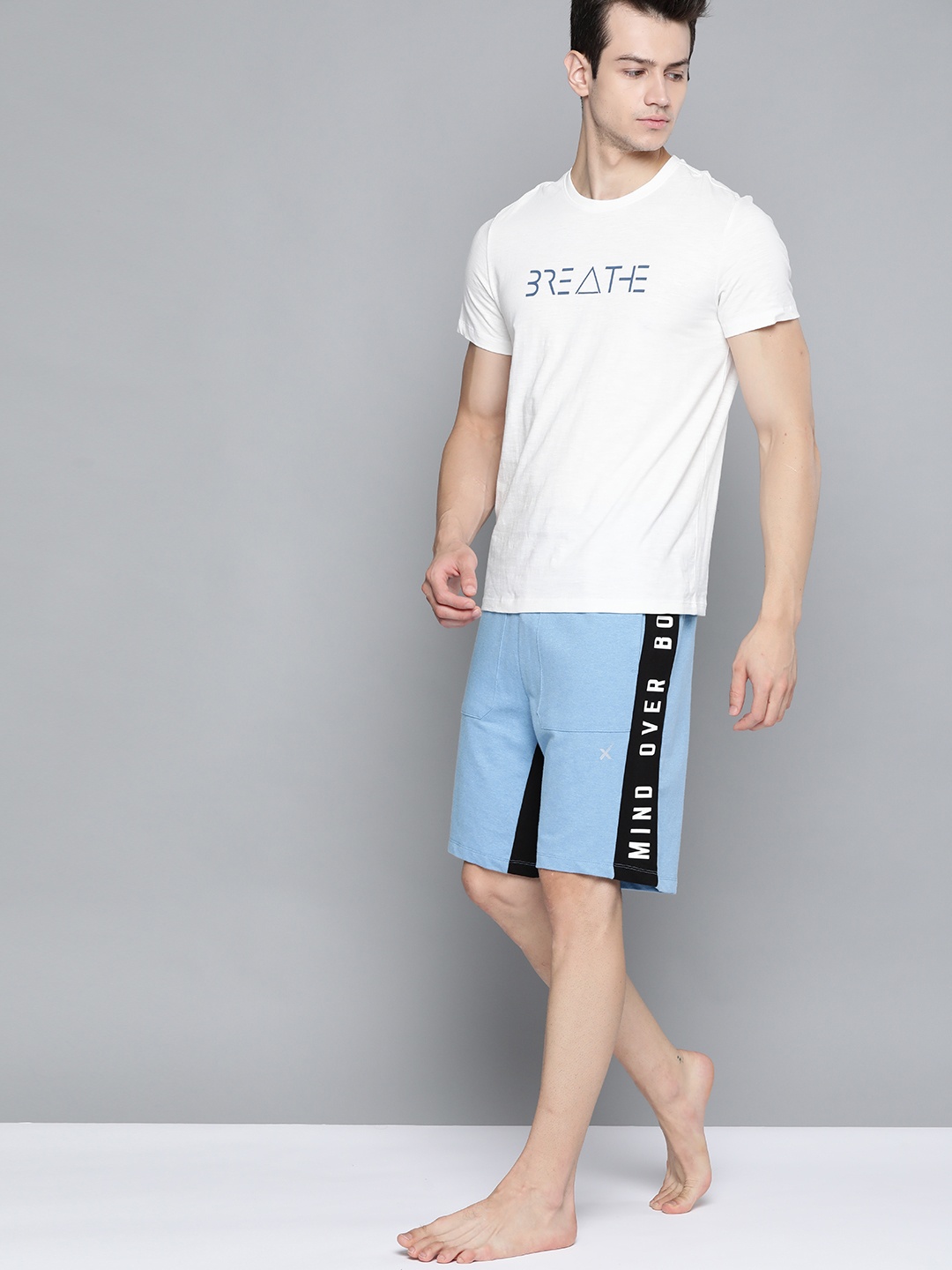 

HRX By Hrithik Roshan Men Jet Black & Blue Melange Colourblock Antimicrobial Yoga Shorts