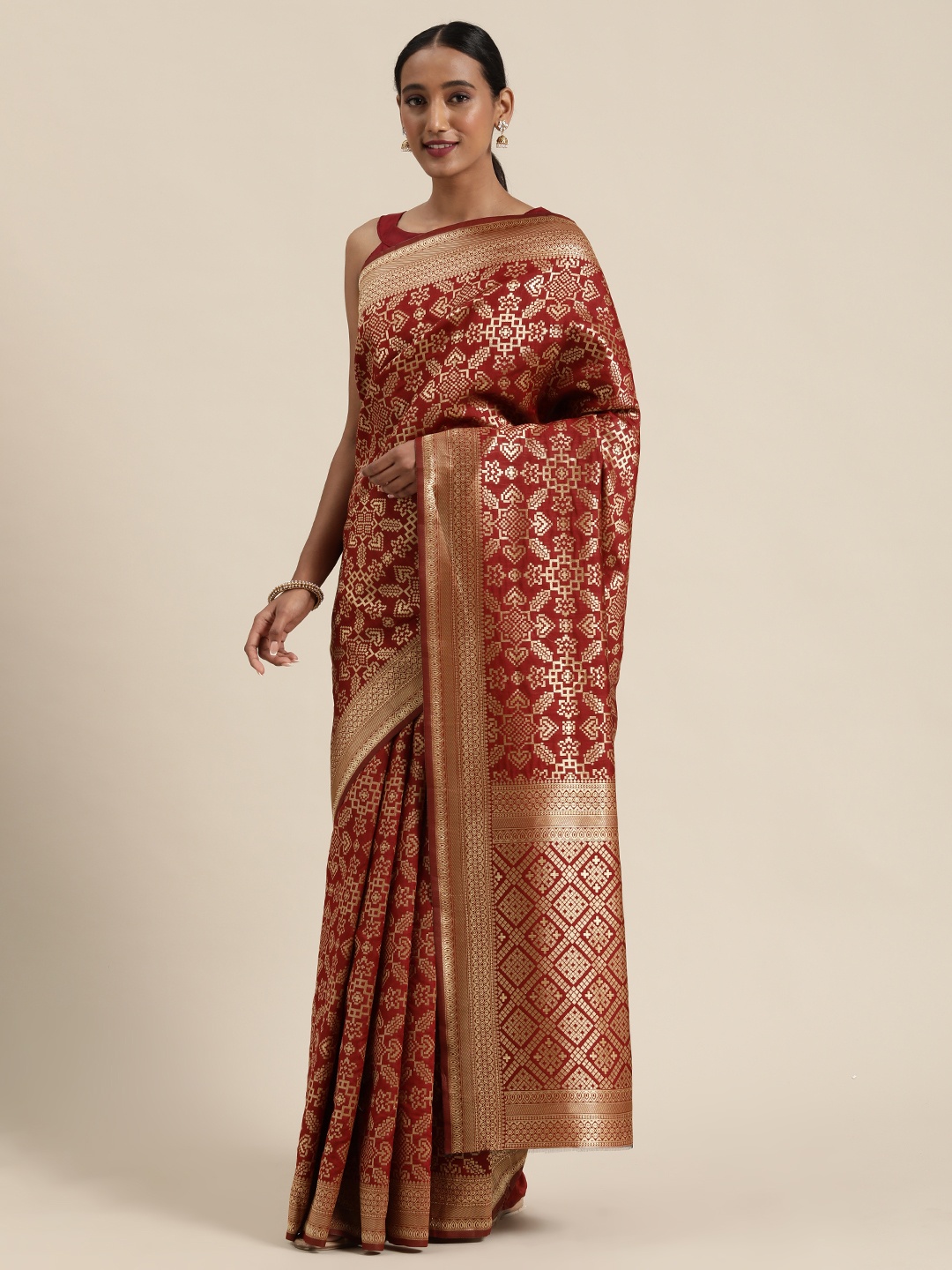

SHAVYA Maroon & Gold-Toned Pure Silk Woven Design Saree