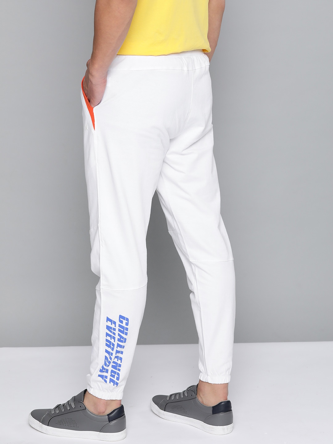 

HRX By Hrithik Roshan Men Optic White Typographic Regular Fit Bio-Wash Lifestyle Joggers