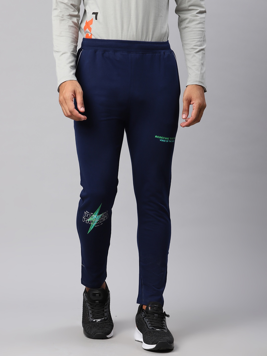 

HRX By Hrithik Roshan Men Navy Blue Printed Detail Slim Fit Bio-Wash Lifestyle Track Pants
