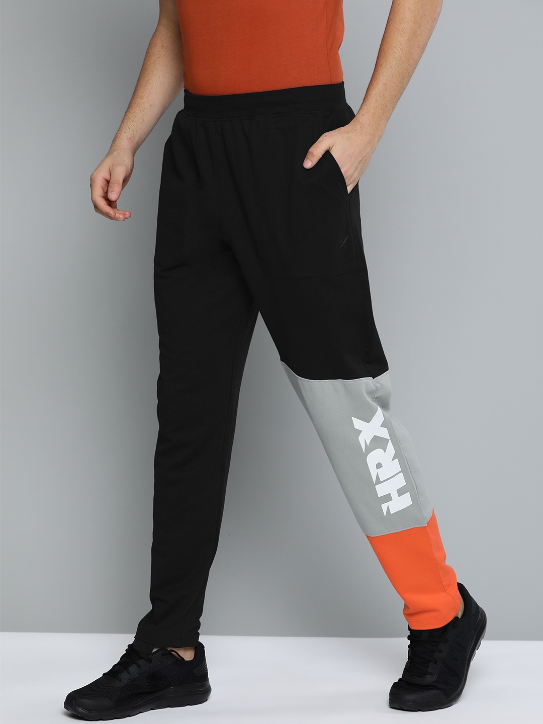 

HRX By Hrithik Roshan Men Jet Black Solid Regular Fit Bio-Wash Lifestyle Track Pants