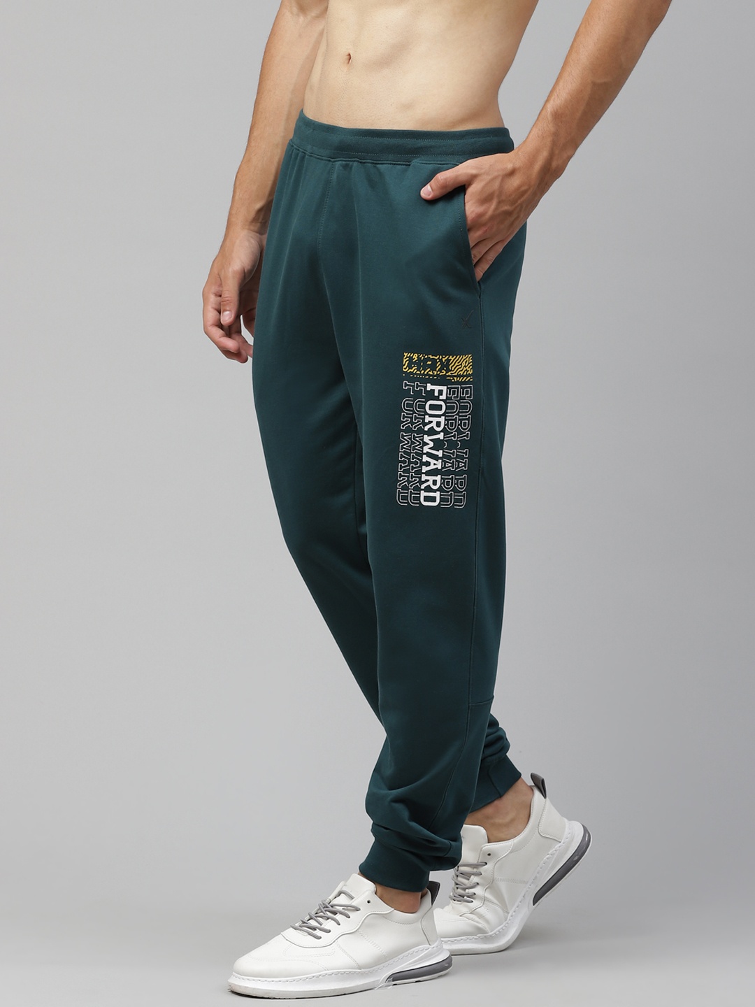 

HRX By Hrithik Roshan Men Ponderosa Pine Solid Slim Fit Bio-Wash Lifestyle Joggers, Green