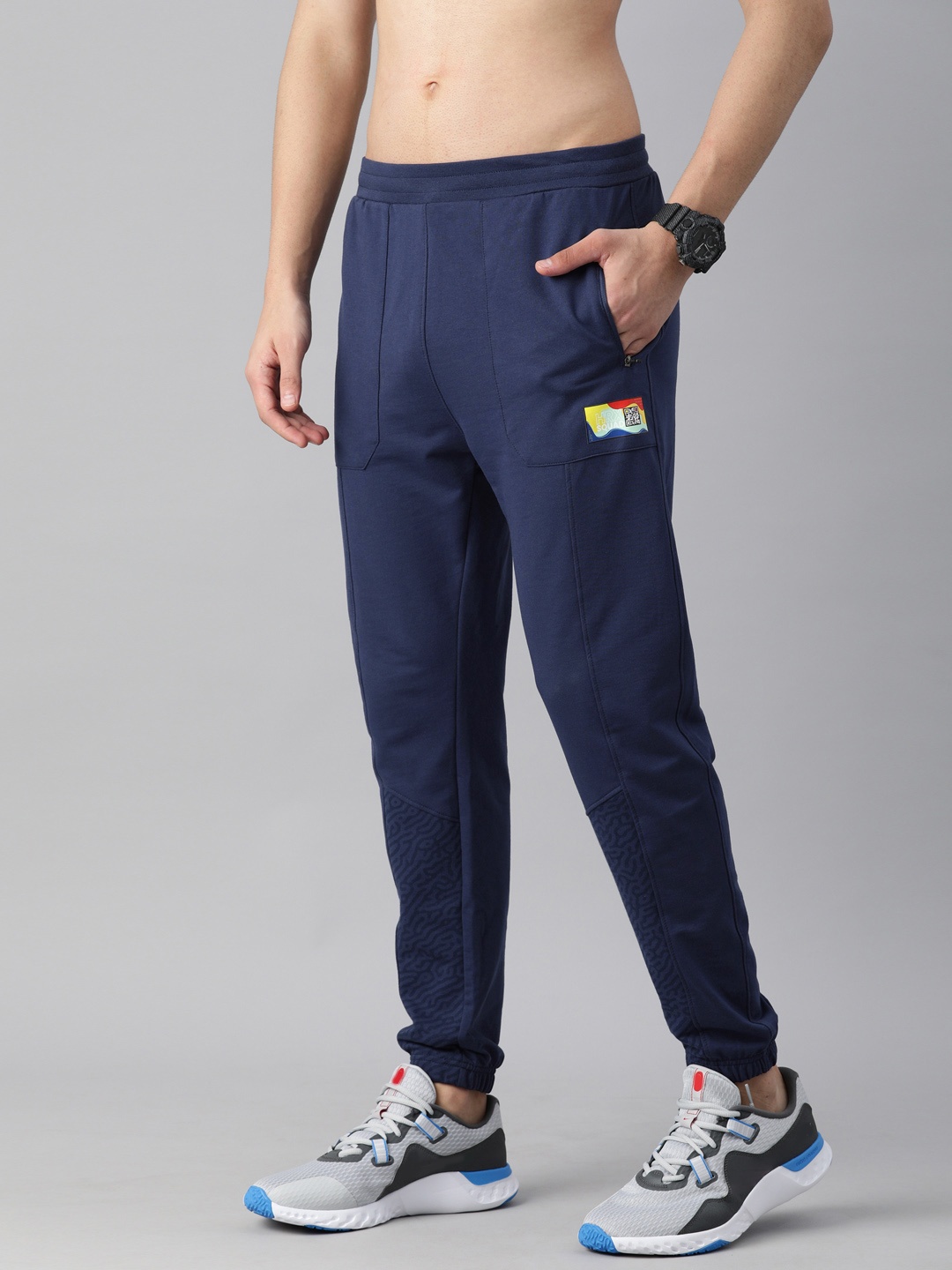 

HRX By Hrithik Roshan Men Navy Blue Solid Slim Fit Bio-Wash Gold Finish Lifestyle Joggers