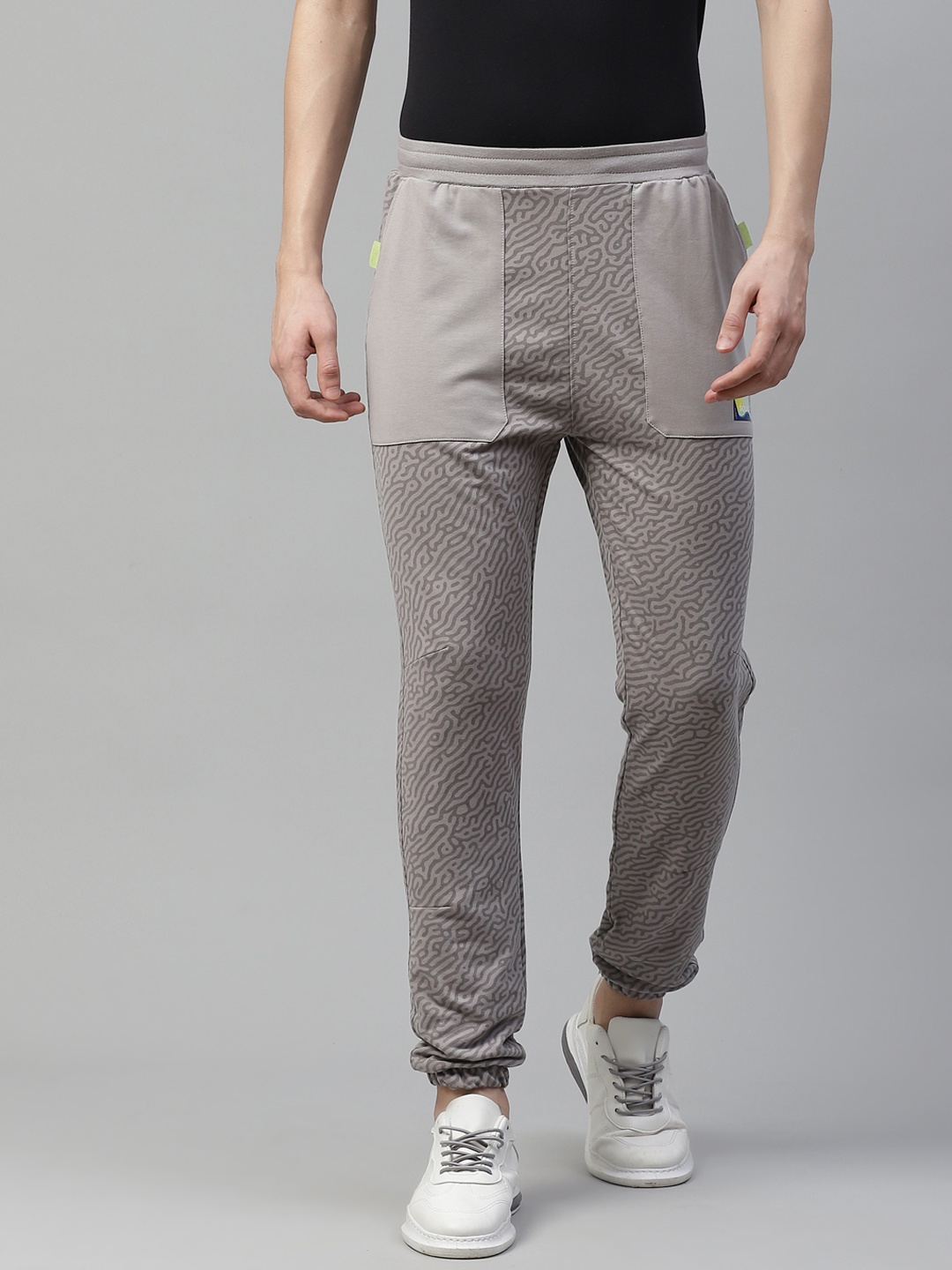 

HRX By Hrithik Roshan Men Wet Weather Aop Slim Bio-Wash Silicone Finish Lifestyle Joggers, Taupe