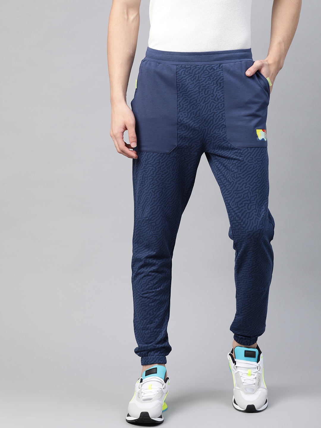 

HRX By Hrithik Roshan Men Medieval Blue Aop Slim Silicone Finish Lifestyle Joggers, Navy blue