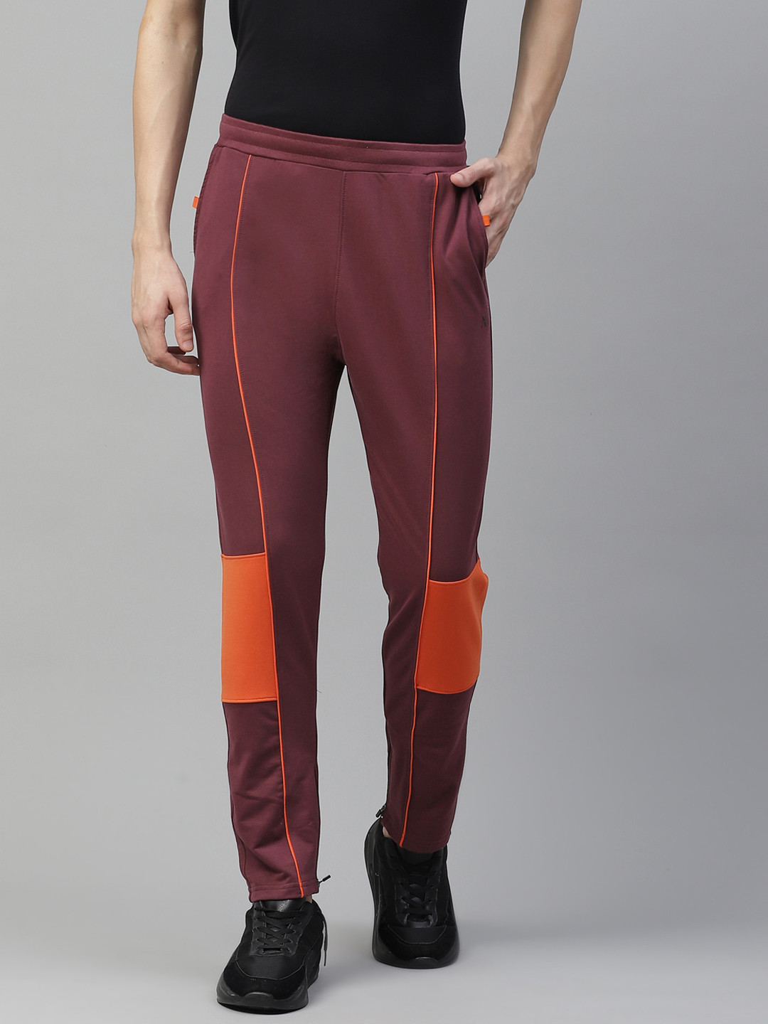 

HRX By Hrithik Roshan Men Fig & Orangeade Slim Fit Bio-Wash Lifestyle Track Pants, Maroon