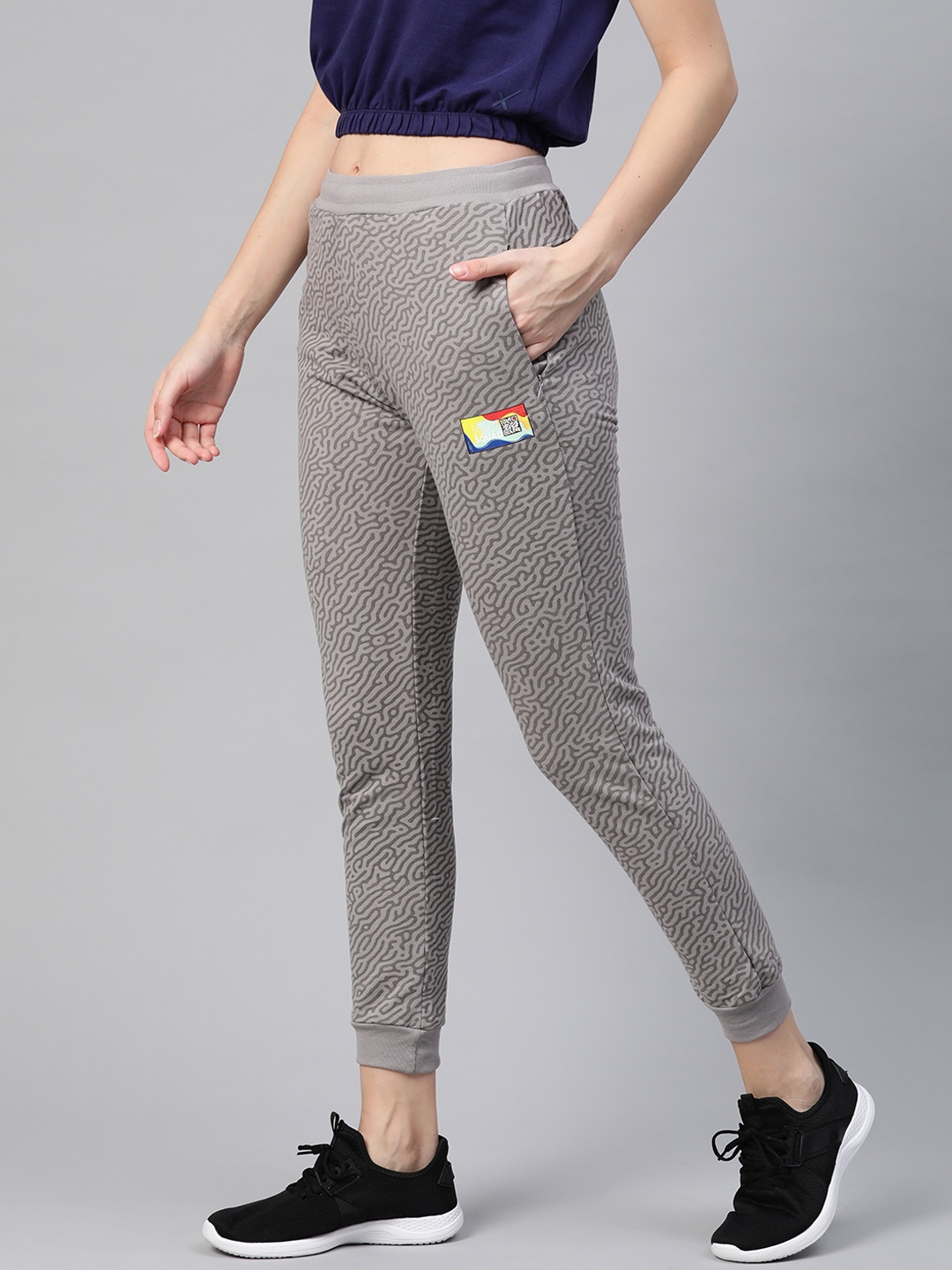 

HRX By Hrithik Roshan Women Wet Weather Aop Regular Fit Bio-Wash Lifestyle Joggers, Grey