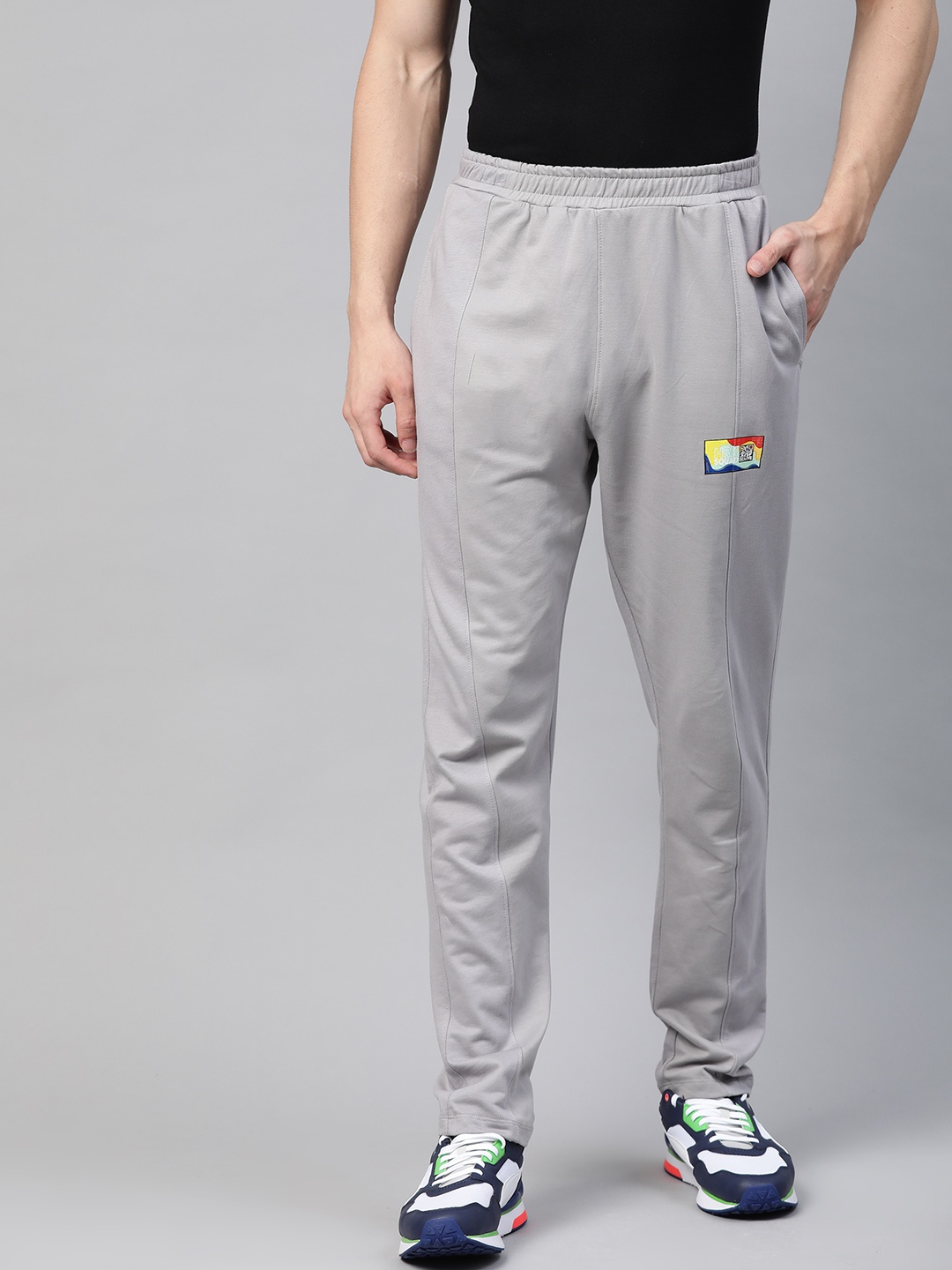 

HRX By Hrithik Roshan Men Wet Weather Solid Melange Silicone Finish Lifestyle Track Pants, Grey