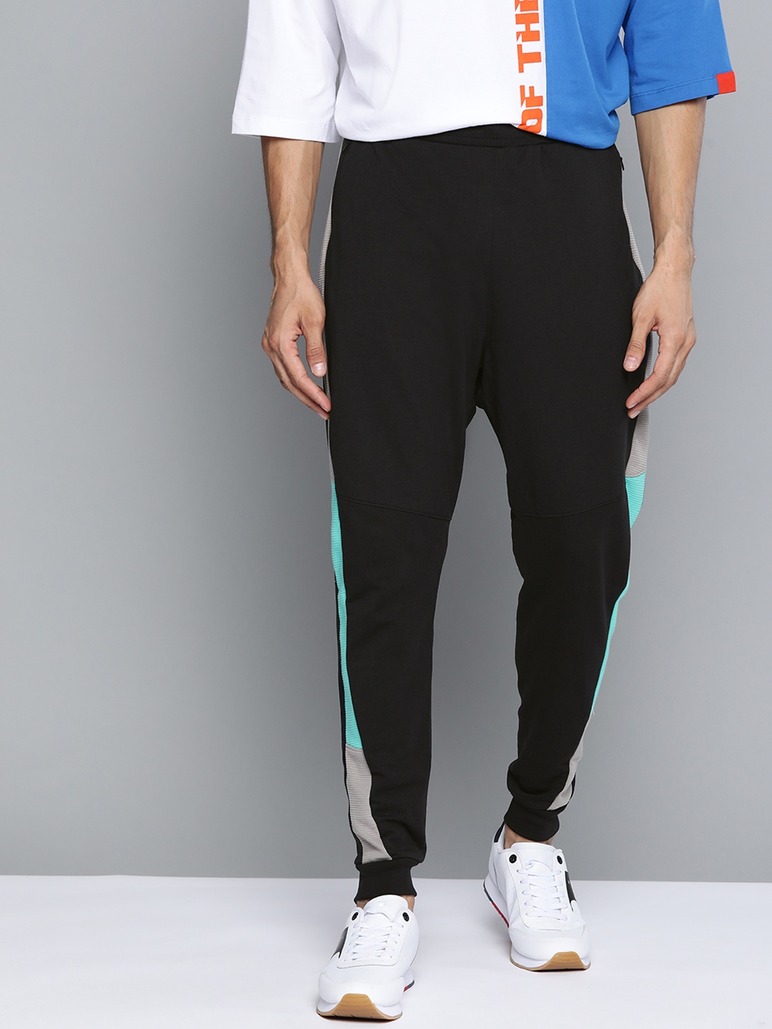 

HRX By Hrithik Roshan Men Jet Black Colourblock Oversized Bio-Wash Lifestyle Joggers