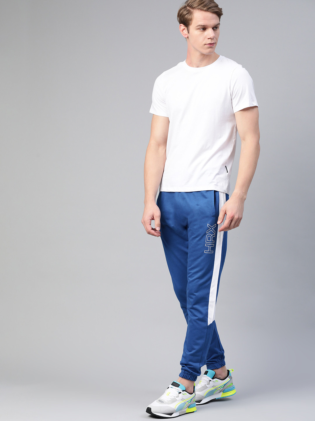 

HRX By Hrithik Roshan Men Strong Blue Solid Bio-Wash Silicone Finish Lifestyle Joggers