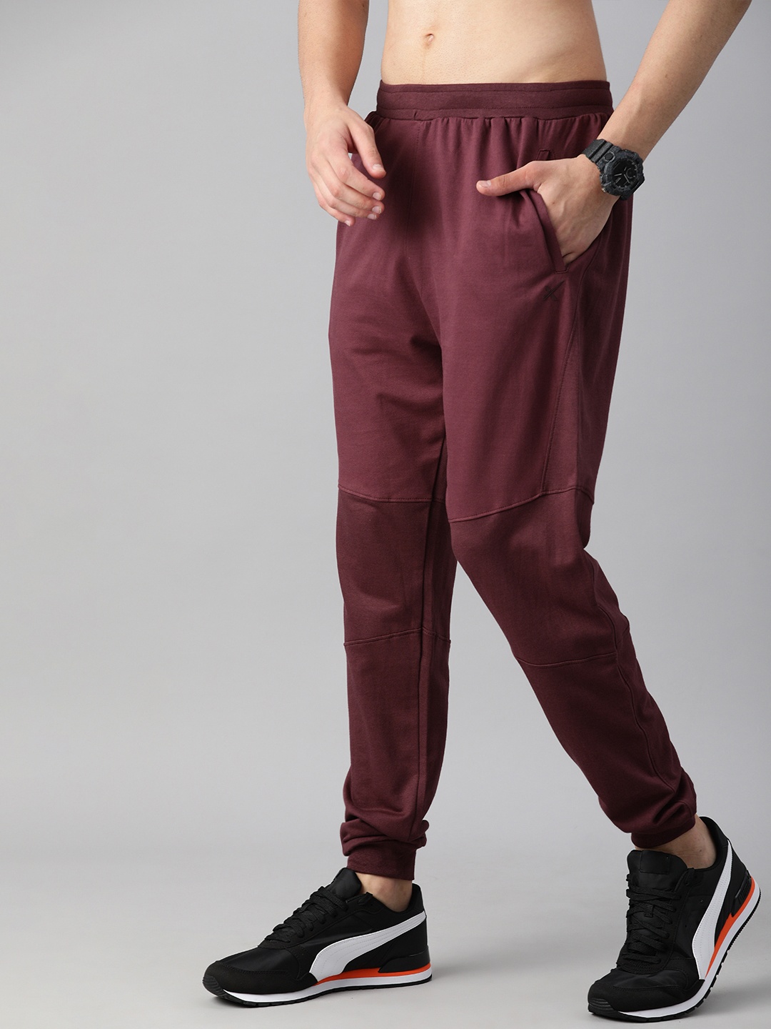 

HRX By Hrithik Roshan Men Fig Solid Melange Bio-Wash Silicone Finish Lifestyle Joggers, Burgundy