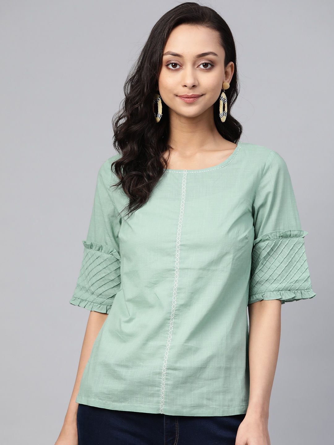 

Fabindia Green Solid Pure cotton Regular Top