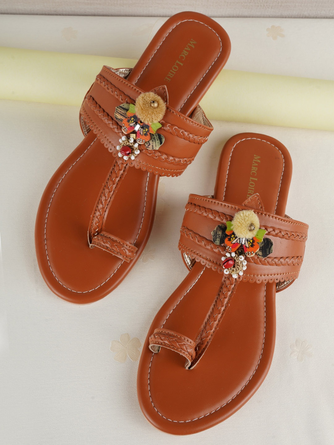 

Marc Loire Women Tan Woven Design T-Strap Flats