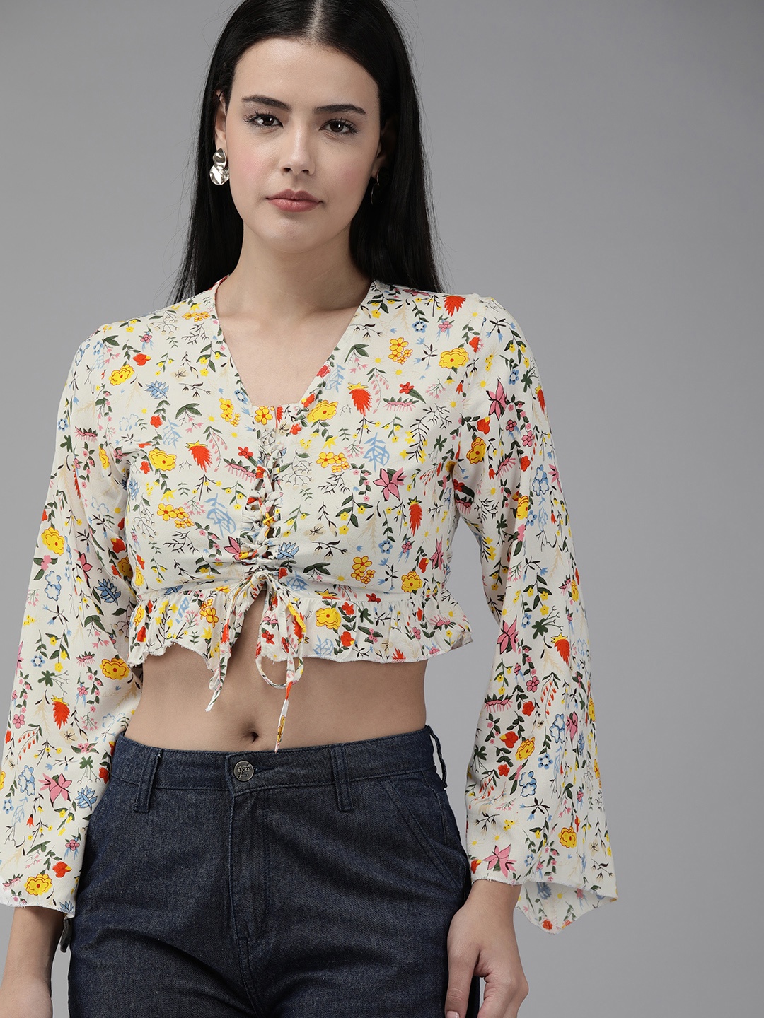 

The Dry State Women White Floral Printed Tie-Up Neck Flared Sleeves Regular Crop Top
