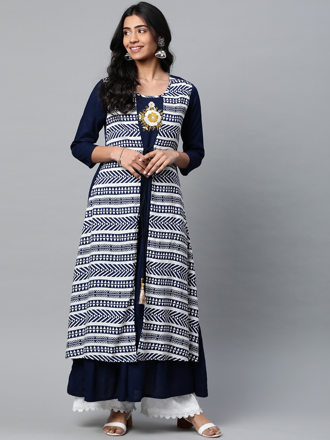 

Yash Gallery Women Navy Blue & White Geometric Printed Thread Work Tiering Kurta