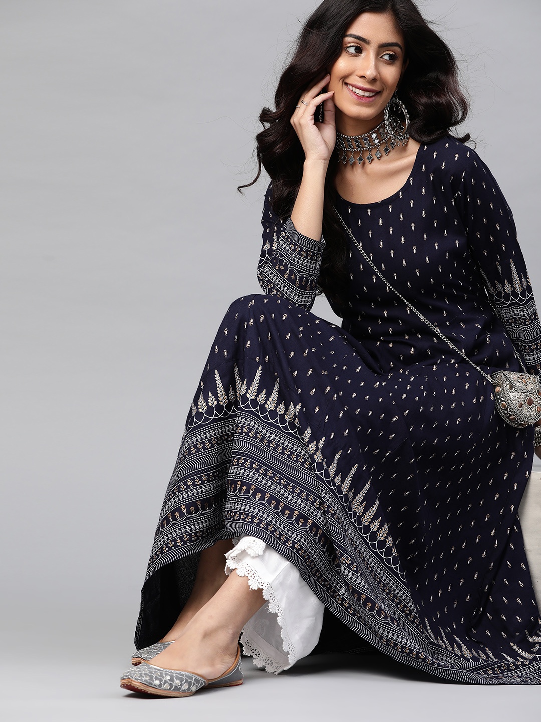 

Mokshi Women Navy Blue & White Ethnic Motifs Printed Indigo A-Line Kurta