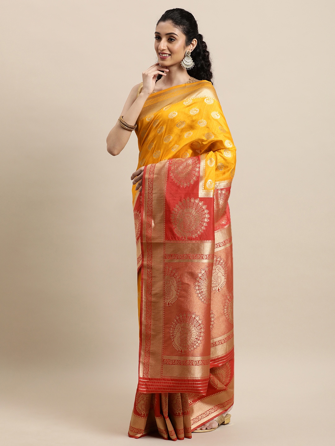 

Mitera Orange & Mustard Ethnic Motifs Zari Silk Blend Banarasi Saree