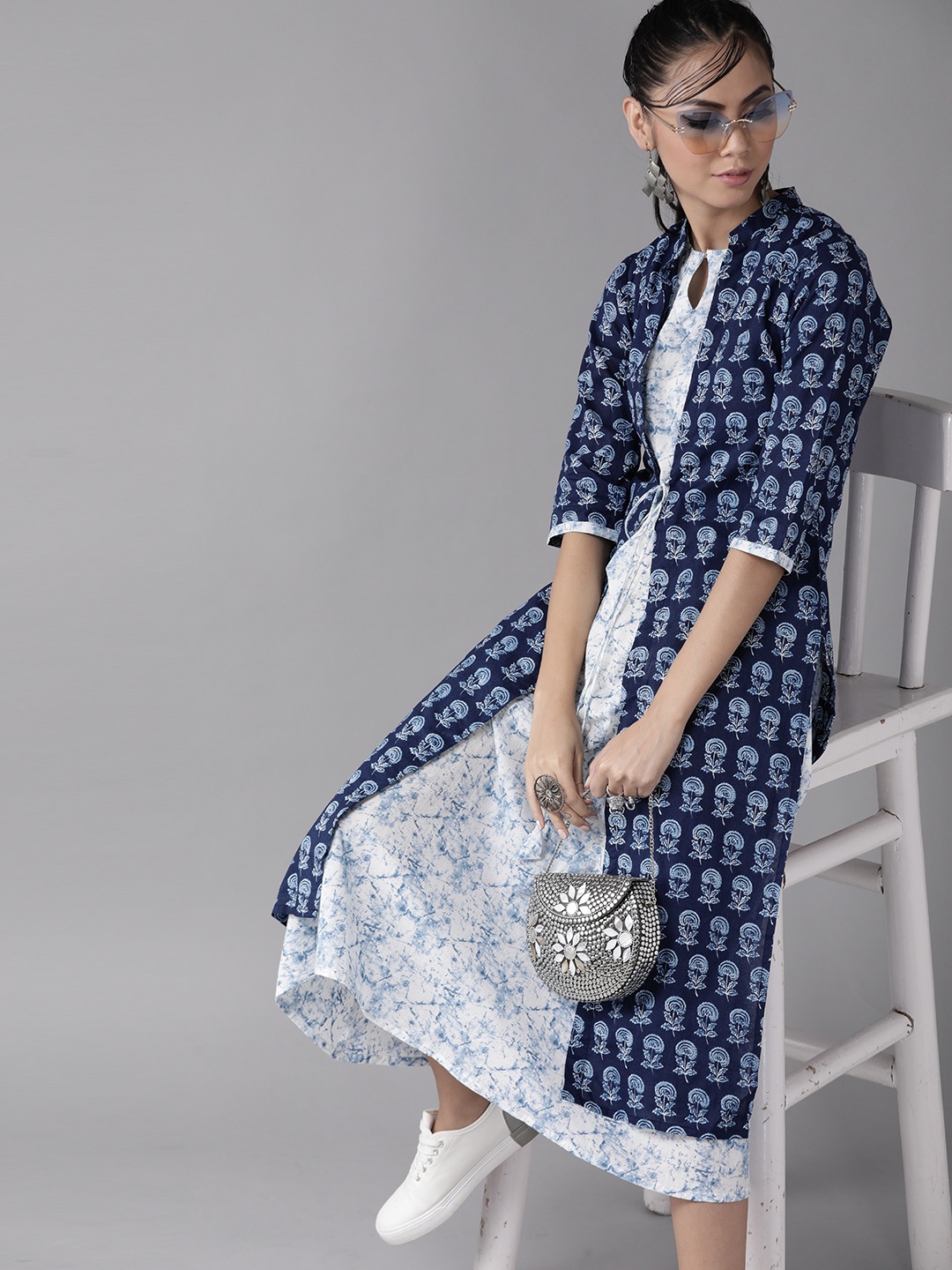 

Libas White & Navy Blue Cotton Floral Motifs Printed A-Line Dress with Longline Shrug