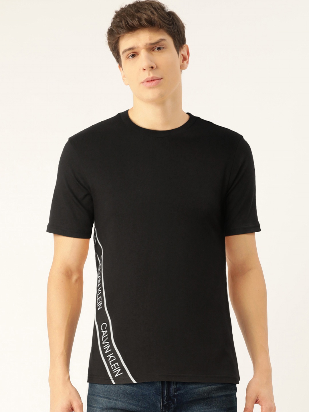 

Calvin Klein Jeans Men Black Solid Round Neck T-shirt