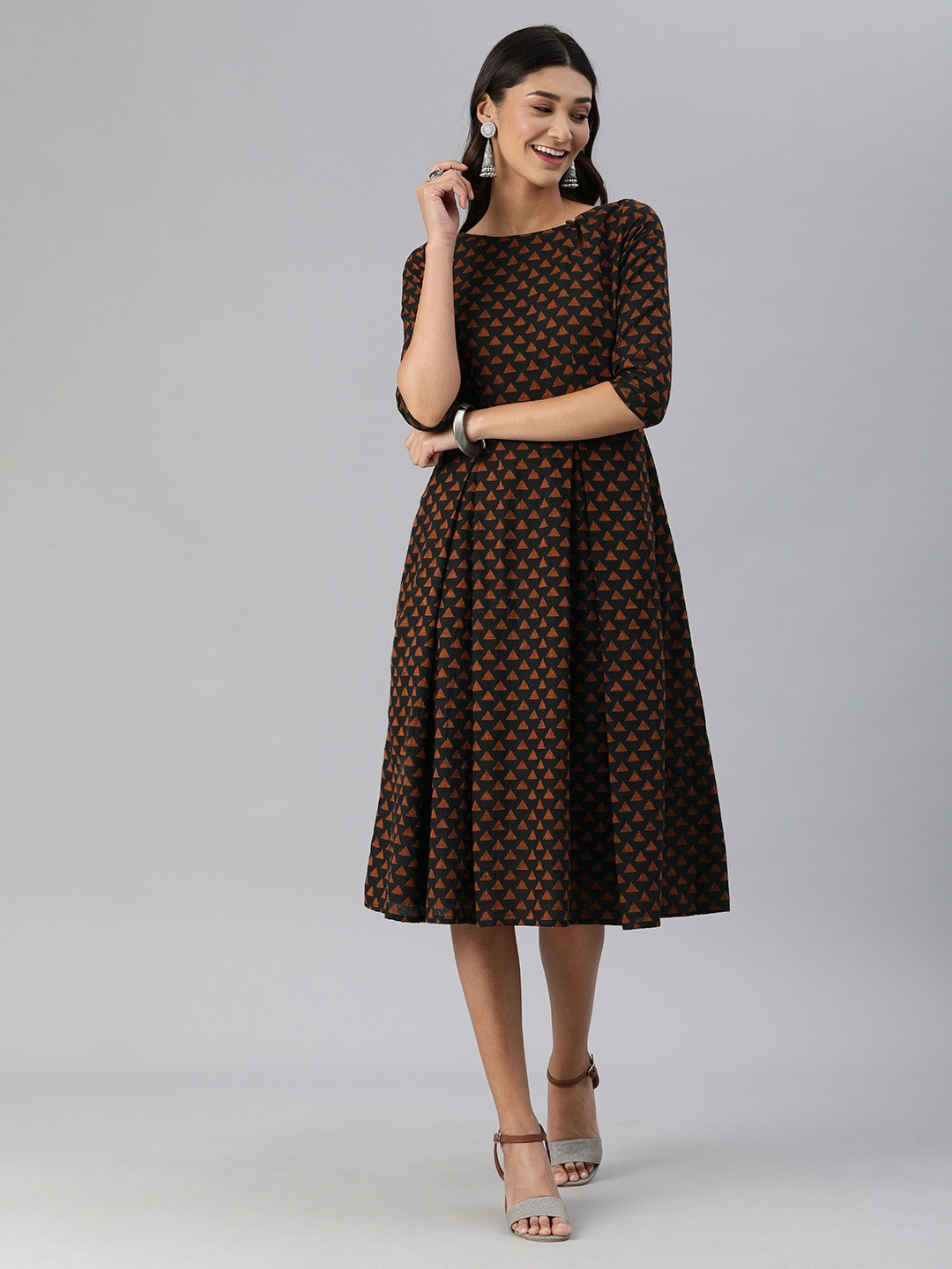 

Swishchick Women Black & Brown Printed Fit and Flare Dress