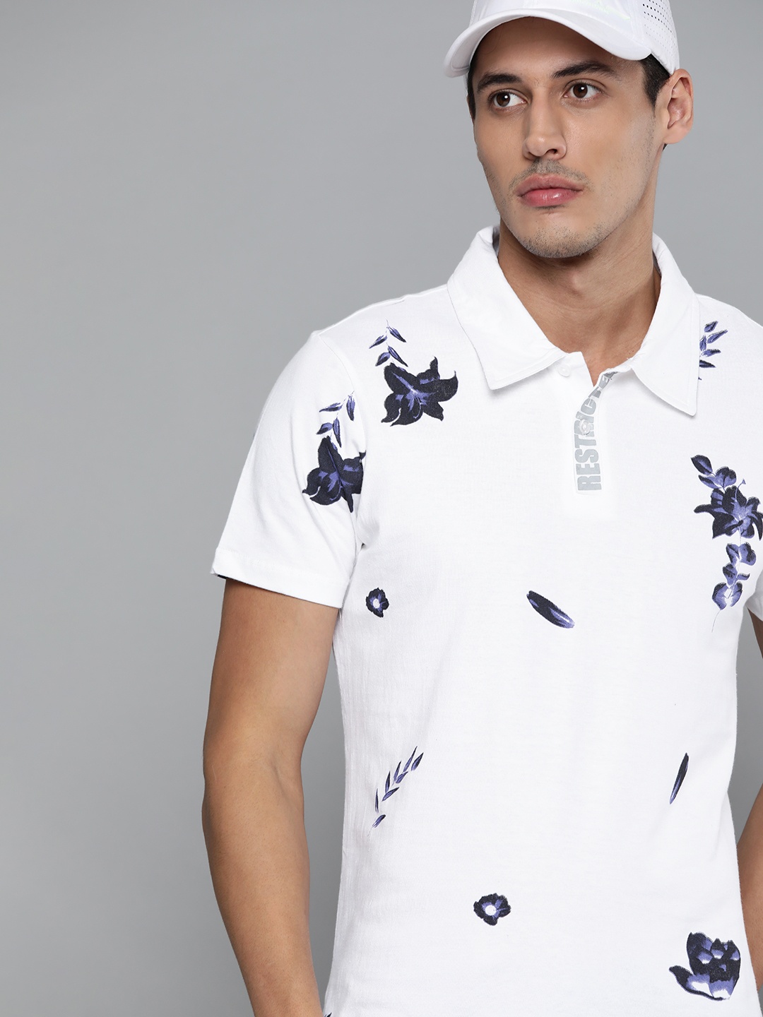 

Kook N Keech Men White & Navy Blue Pure Cotton Floral Printed Polo Collar T-shirt