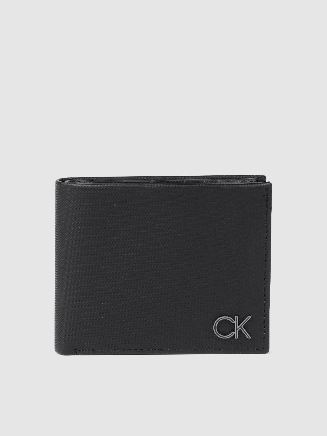 

Calvin Klein Men Black Solid Leather Two Fold Wallet