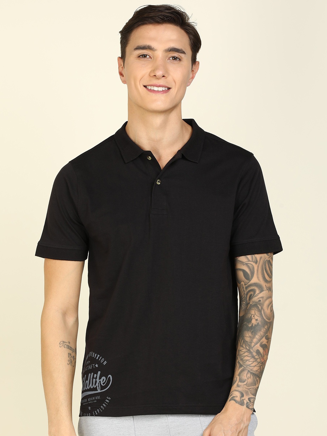 

Wildcraft MenBlack Printed Polo Collar T-shirt, Black