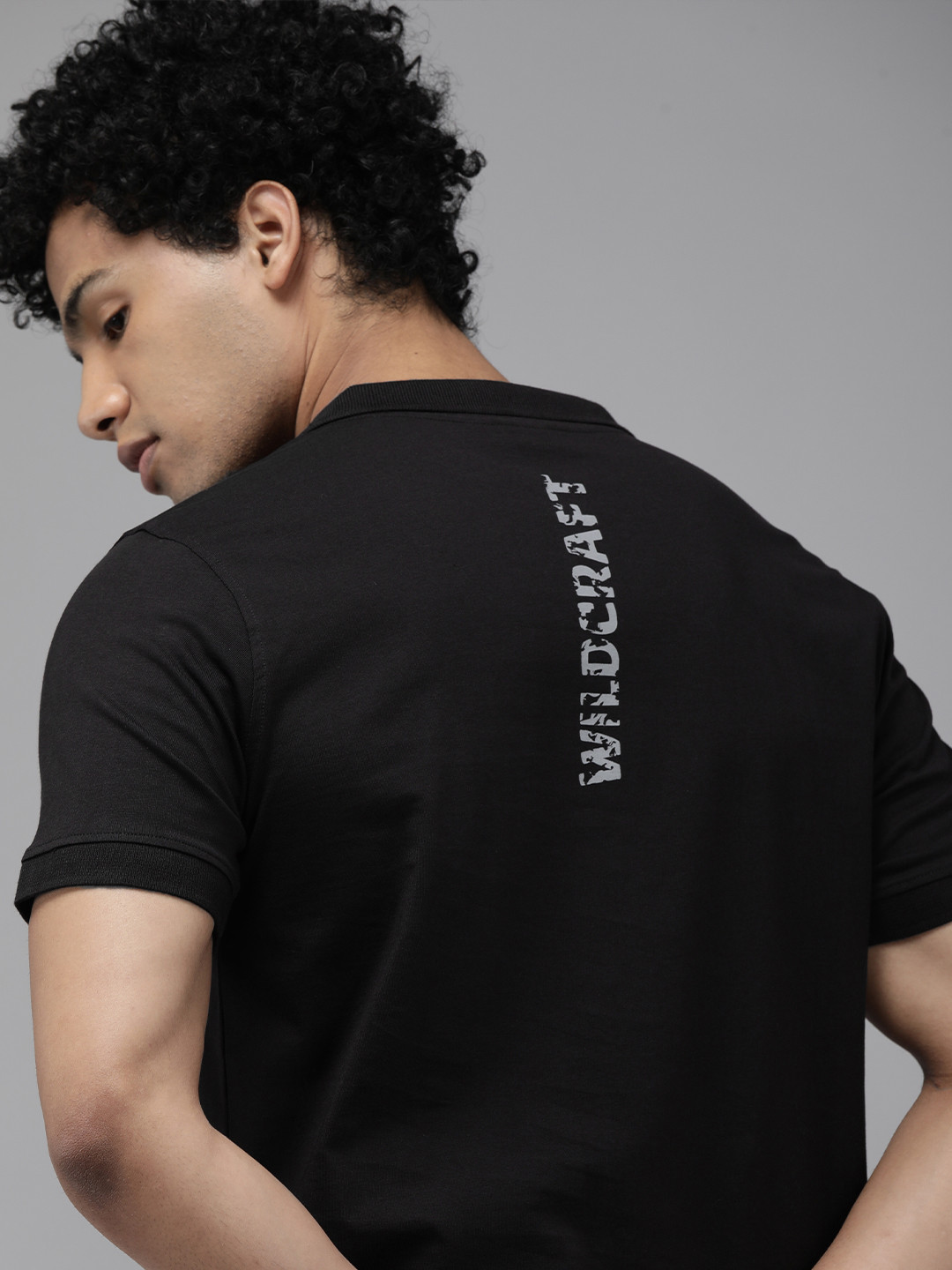 

Wildcraft Men Solid Black Brand Logo Polo Collar Slim Fit T-shirt