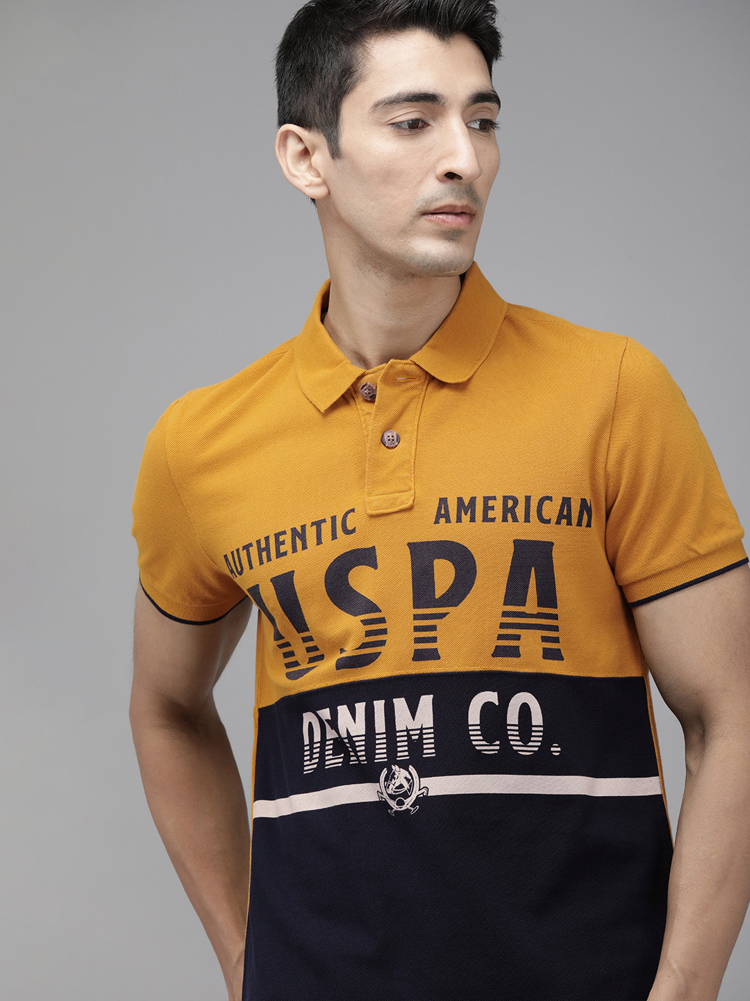 

U.S. Polo Assn. Denim Co. Men Mustard Yellow Black Printed Polo Collar Pure Cotton T-shirt