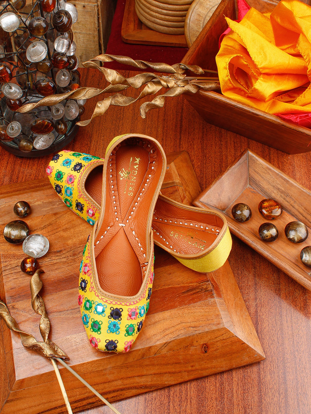 

Sringam Women Yellow Woven Design Leather Mojaris