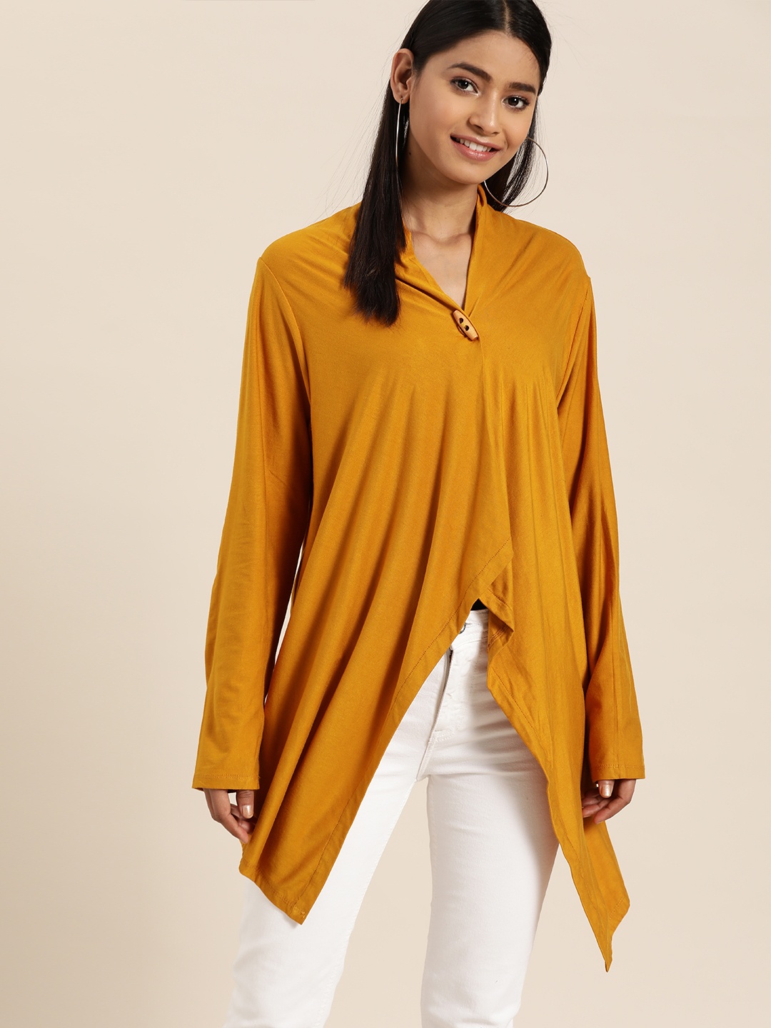 

Qurvii Women Mustard Yellow Solid Asymmetric Button Shrug