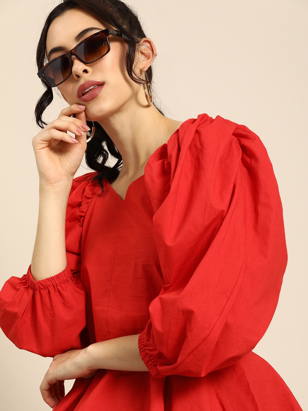 

Athena Ravishing Red Power Shoulders Peplum Top