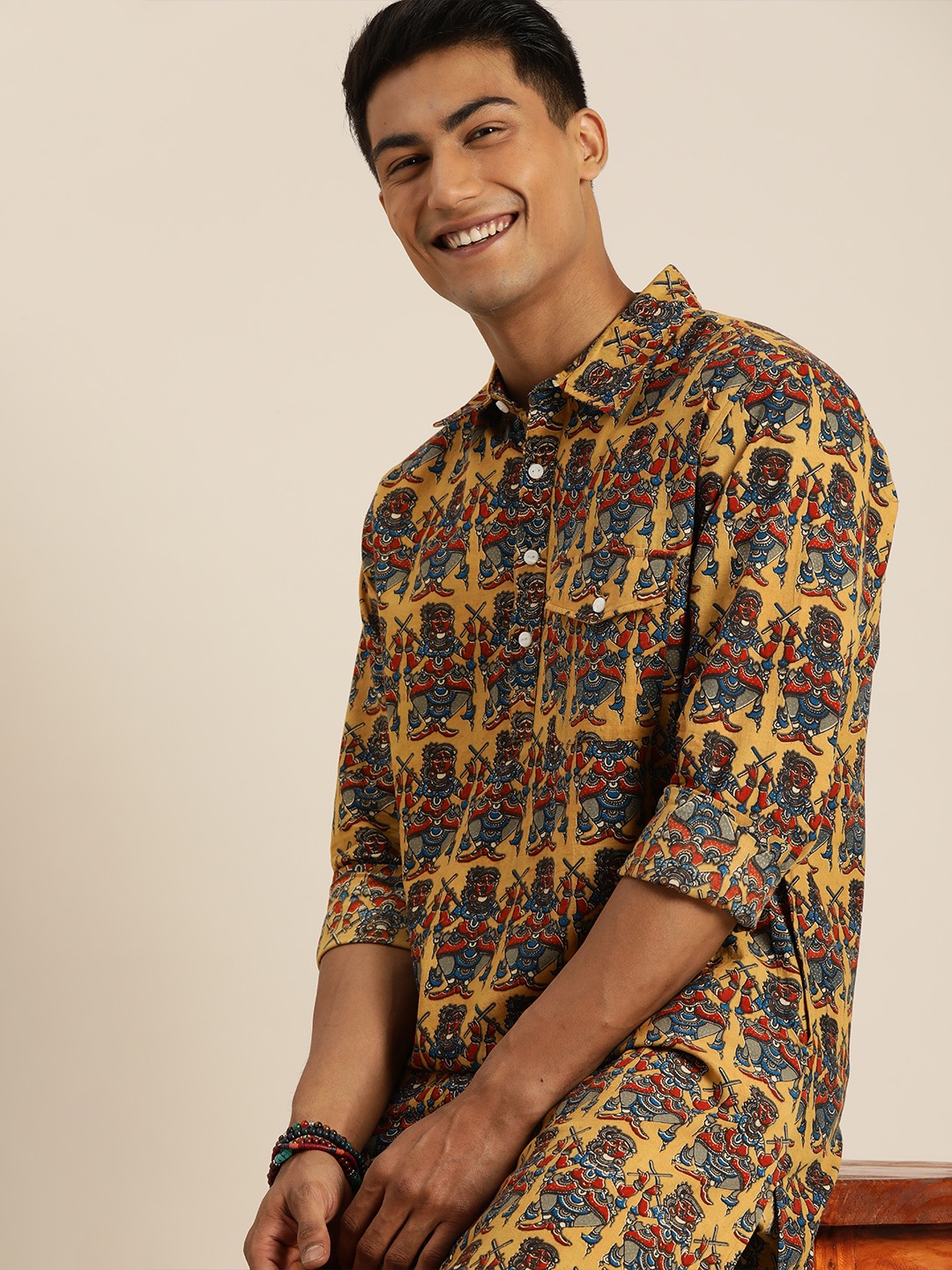 

Taavi Men Mustard Yellow & Blue Kalamkari Block Printed Straight Sustainable Kurta