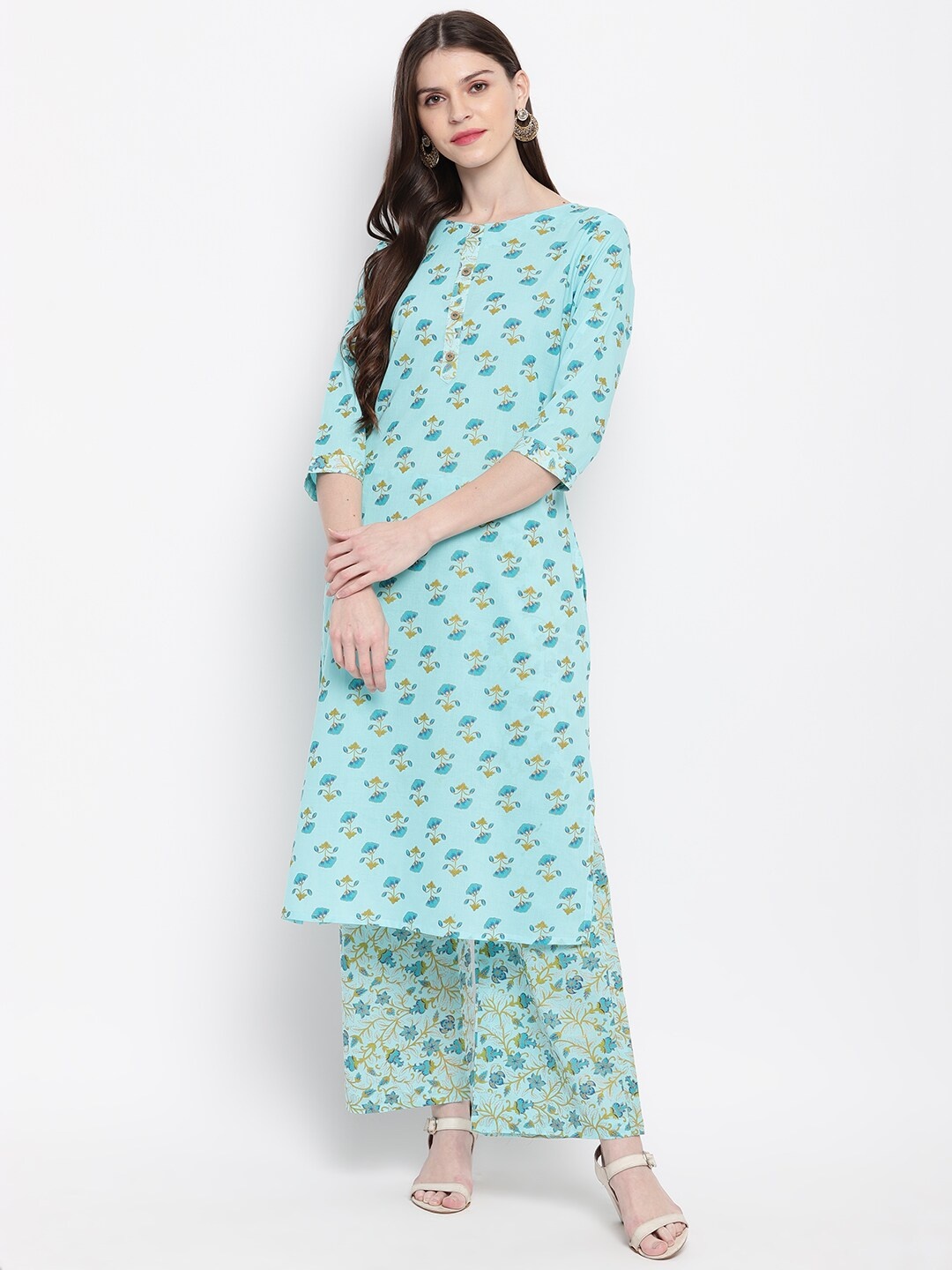 

Janasya Women Turquoise Blue Printed Kurta with Palazzos