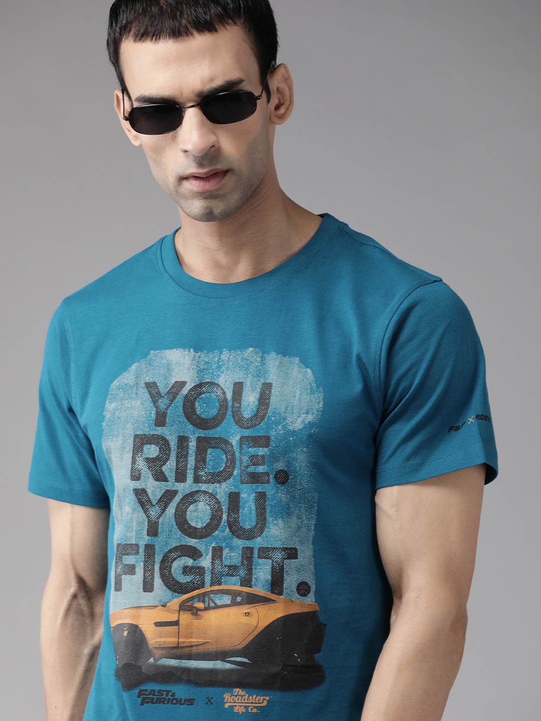 

Roadster Men Blue & Black Pure Cotton Typography Printed T-shirt