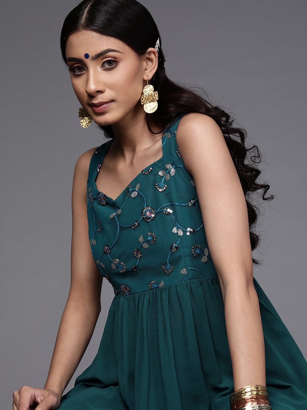 

Inddus Women Teal Green Yoke Design Kurti with Palazzos