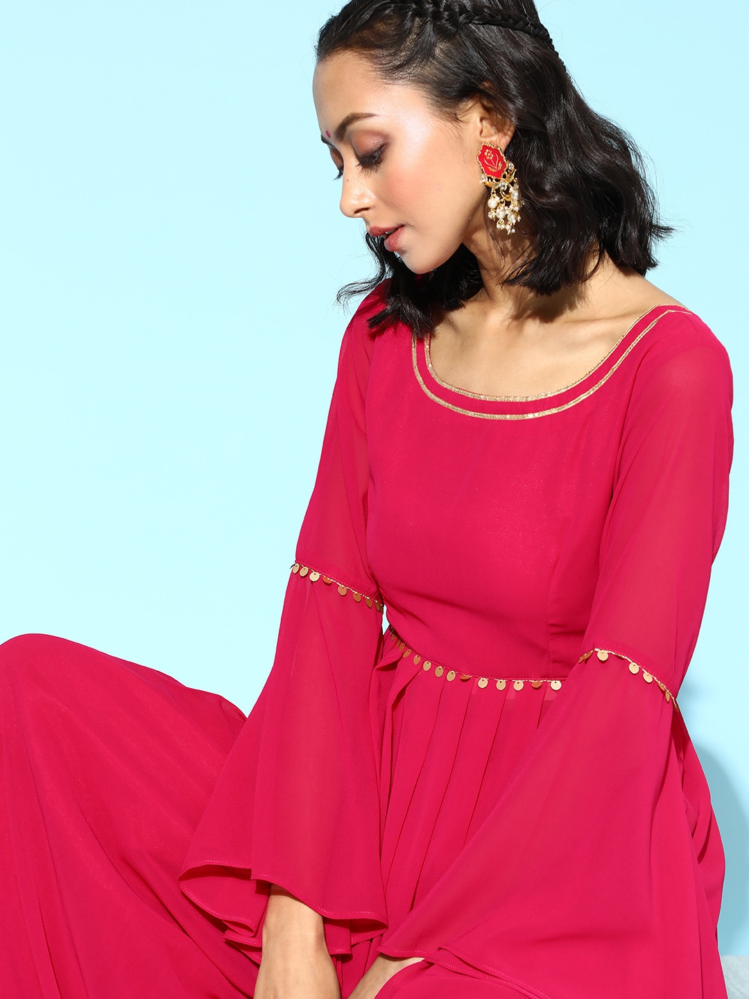 

Inddus Women Stunning Magenta Solid Top with Palazzo