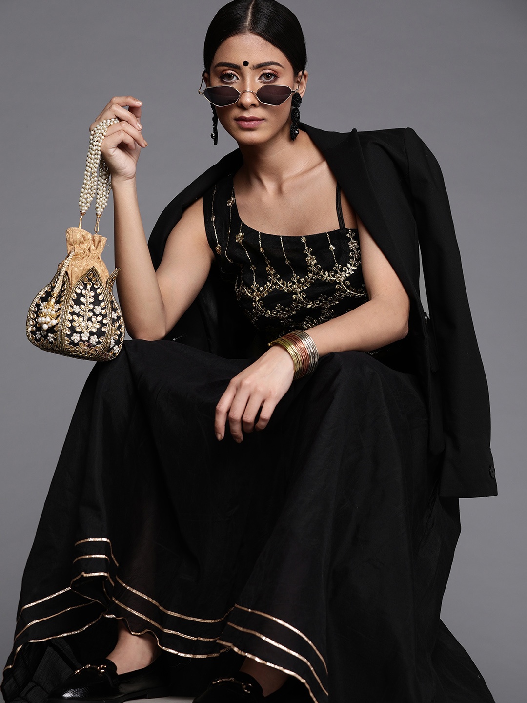 

Inddus Women Black & Golden Embroidered Top with Skirt