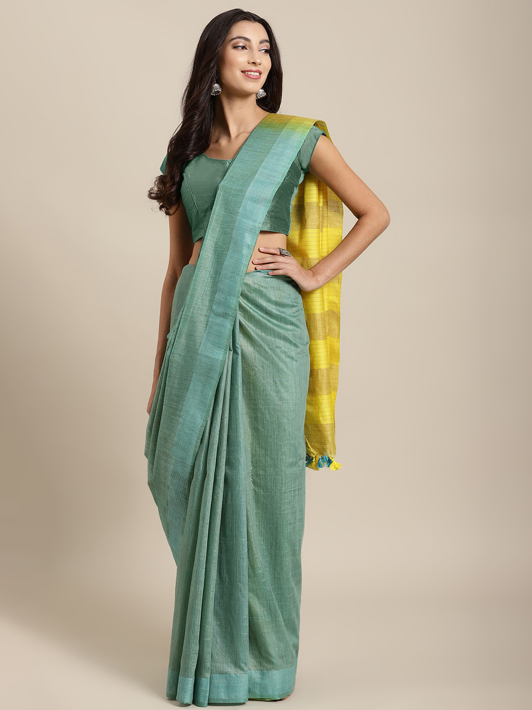 

Kalakari India Sea Green & Yellow Solid Bhagalpuri Saree