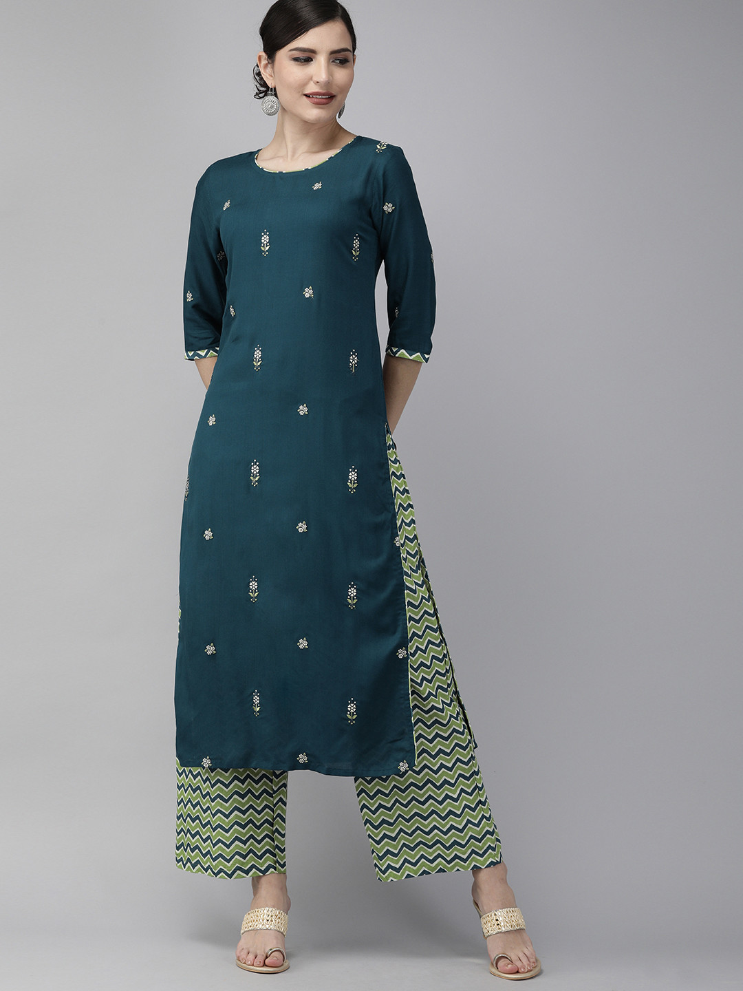 

Indo Era Women Teal Green & White Embroidered Kurta with Palazzos