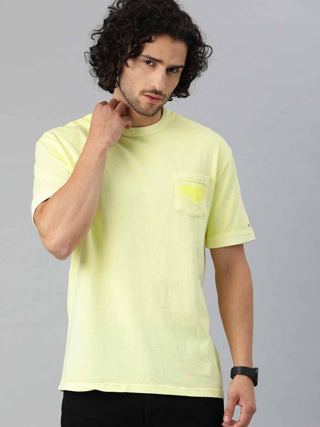

Tommy Hilfiger Men Lime Green Solid Round Neck Pure Cotton T-shirt with Pocket Detailing