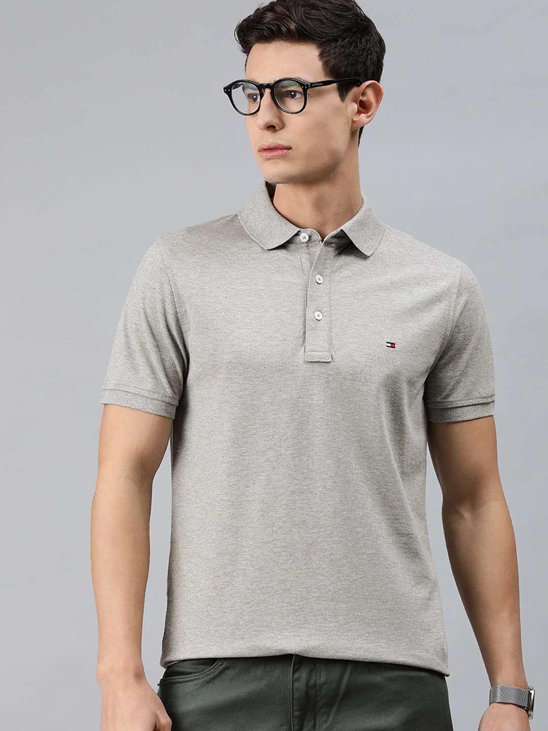 

Tommy Hilfiger Men Grey Solid Pure Cotton Polo Collar Pure Cotton T-shirt