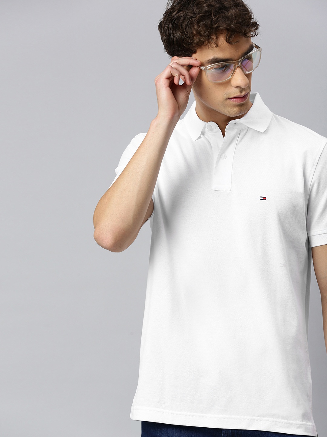 

Tommy Hilfiger Men White Solid Pure Cotton Polo Collar Pure Cotton T-shirt