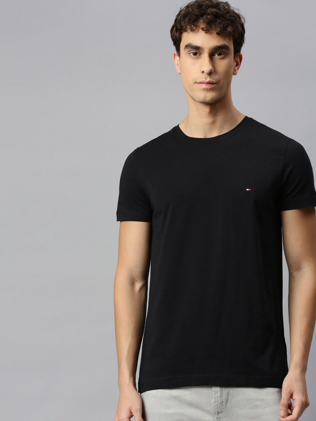 

Tommy Hilfiger Men Black Solid Round Neck T-shirt