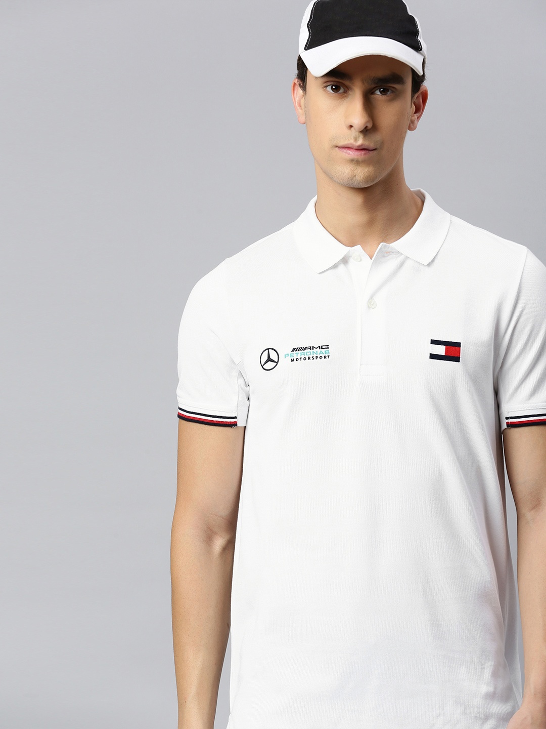 

Tommy Hilfiger Men White Solid Slim Fit Polo Collar T-shirt