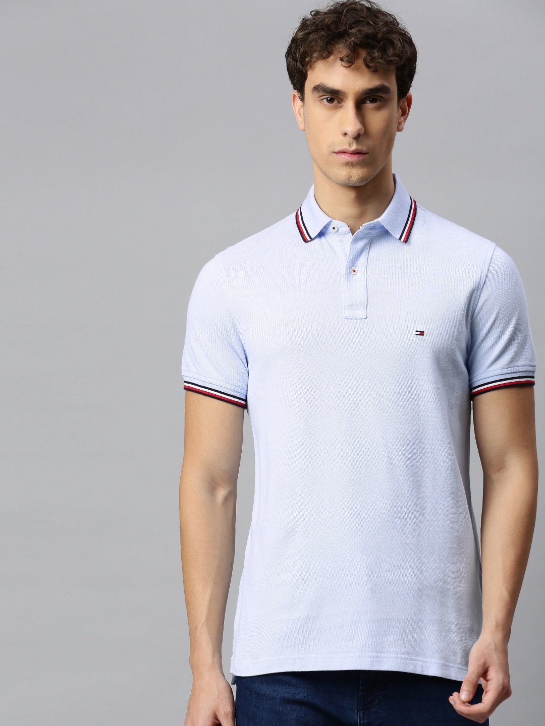 

Tommy Hilfiger Men Blue Solid Slim Fit Polo Collar Organic Cotton T-shirt